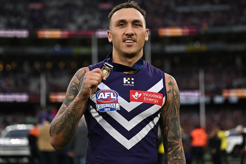 Shai Bolton shows off the Norm Smith Medal after the 2026 AFL grand final.