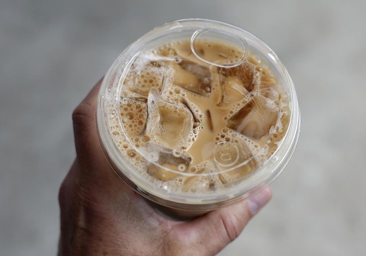 In this photo illustration, a Dunkin' iced coffee is displayed at a Dunkin' Donuts store on March 4 in Burbank, California. gettyimagesbank-TNS