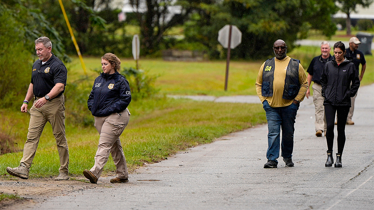 Authorities investigate the scene of a mass shooting